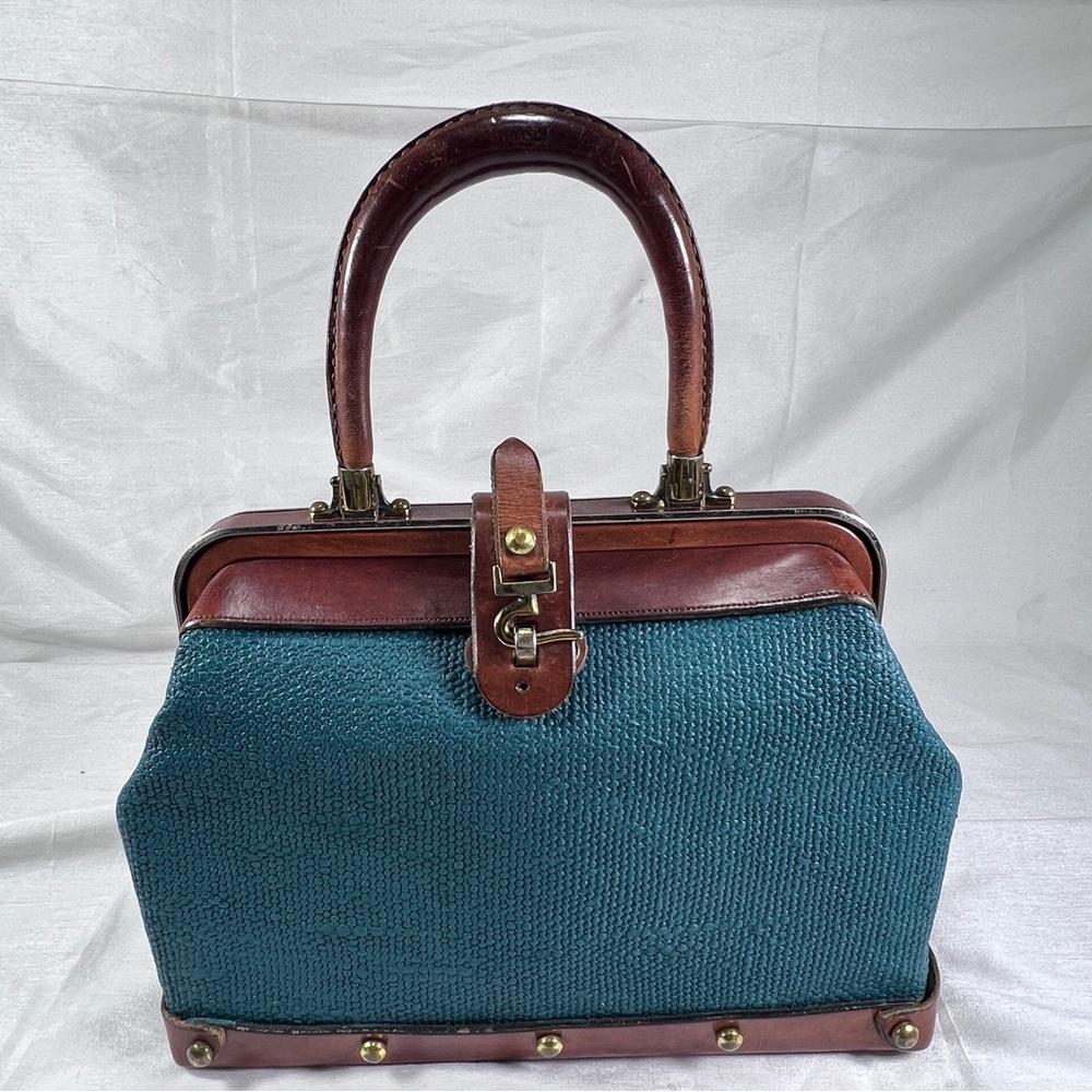 Vintage teal canvas and leather satchel